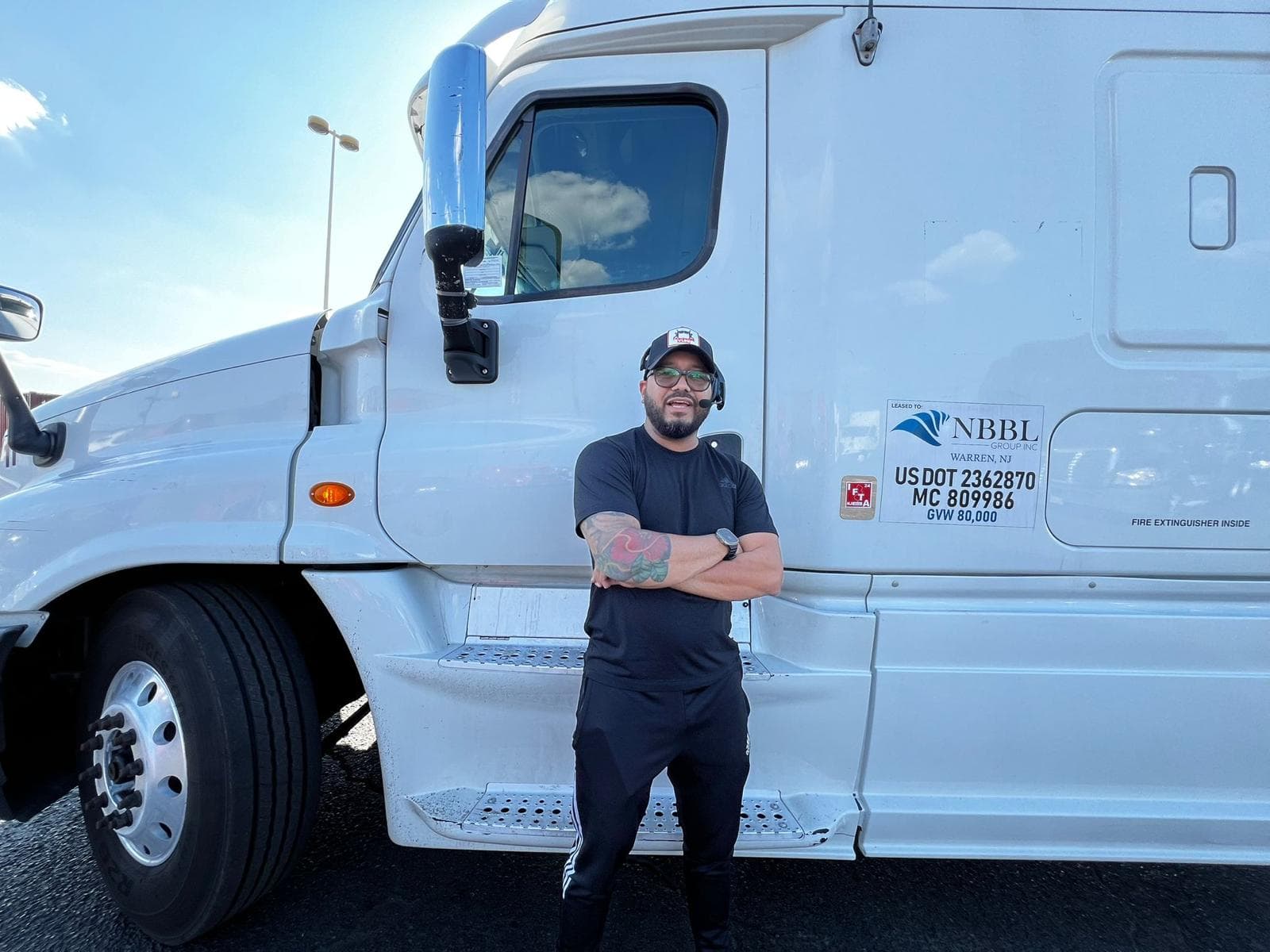 NBBL Group driver at Freightliner tractor at Elizabeth New Jersey port yard